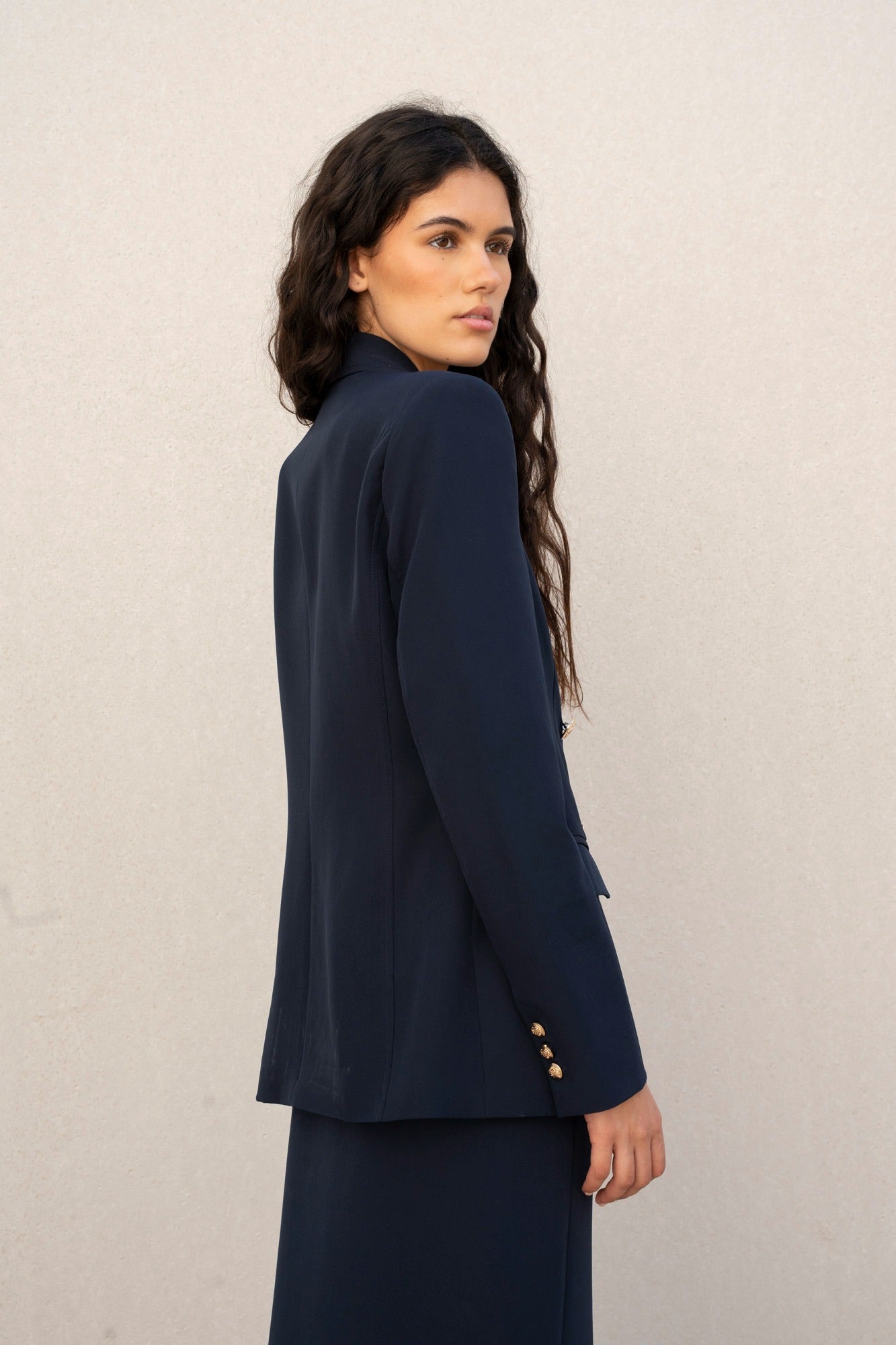 Blazer con bottoni dorati